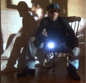 Rango's Gloves Glowing with Mojo Rango in the rocking chair, gloves glowing with mojo.